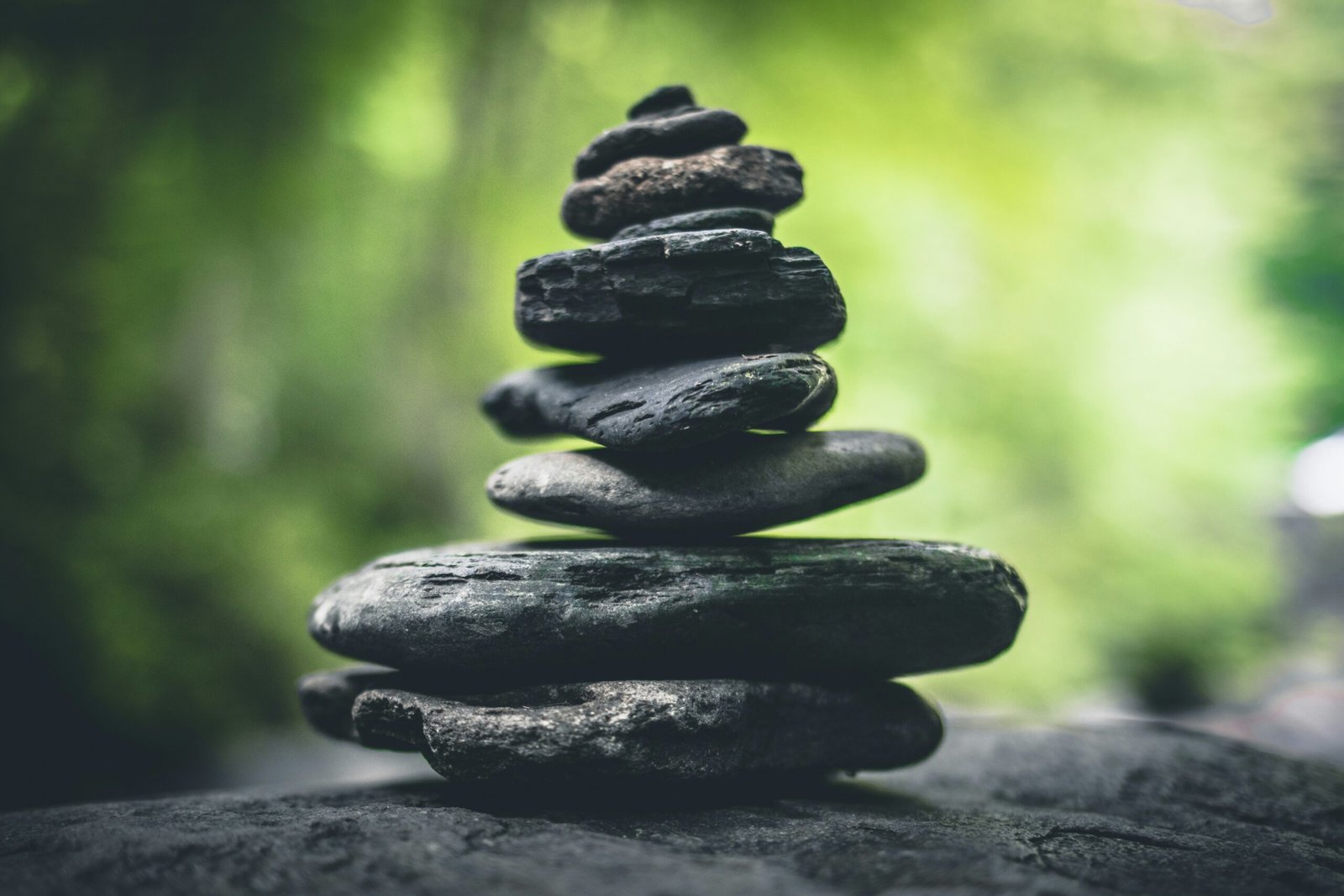 Zen balancing rocks in the Great Smoky Mountains, symbolizing the balance between real conversations and fictional dialogue.